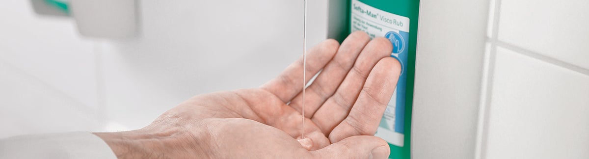 Hand disinfection dispenser